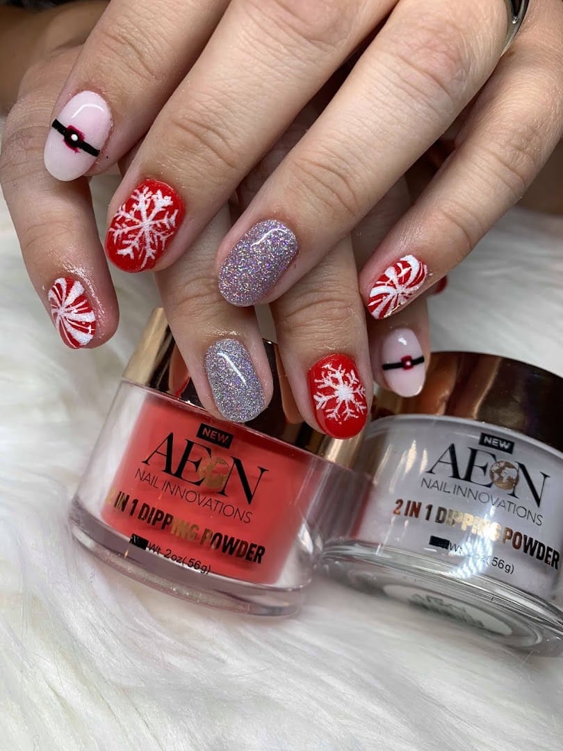 Festive red and glitter Christmas manicure with dipping powder jars